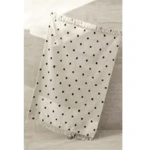tapis en coton blanc avec des motifs de couleur noir